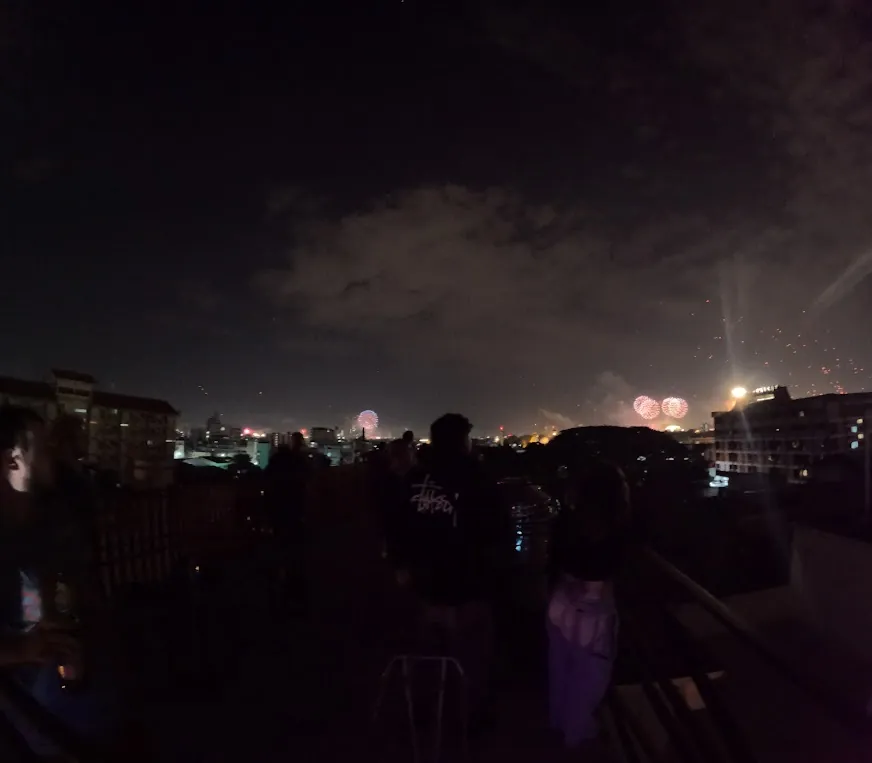 Well-stocked bar counter with seating